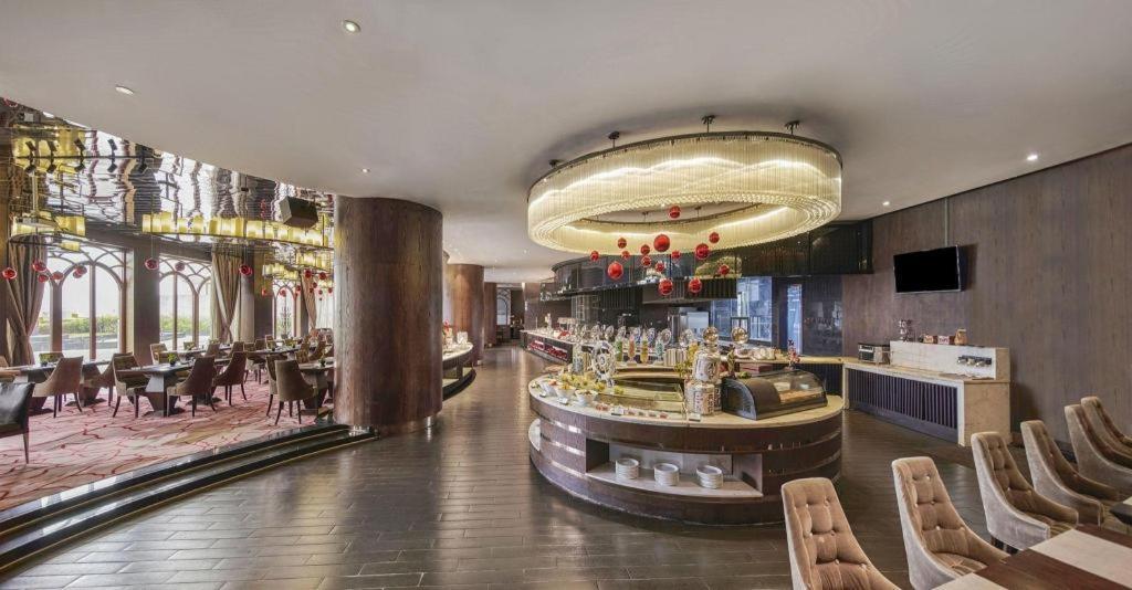Maison New Century Hotel Dongguan Dongguan  Exterior foto